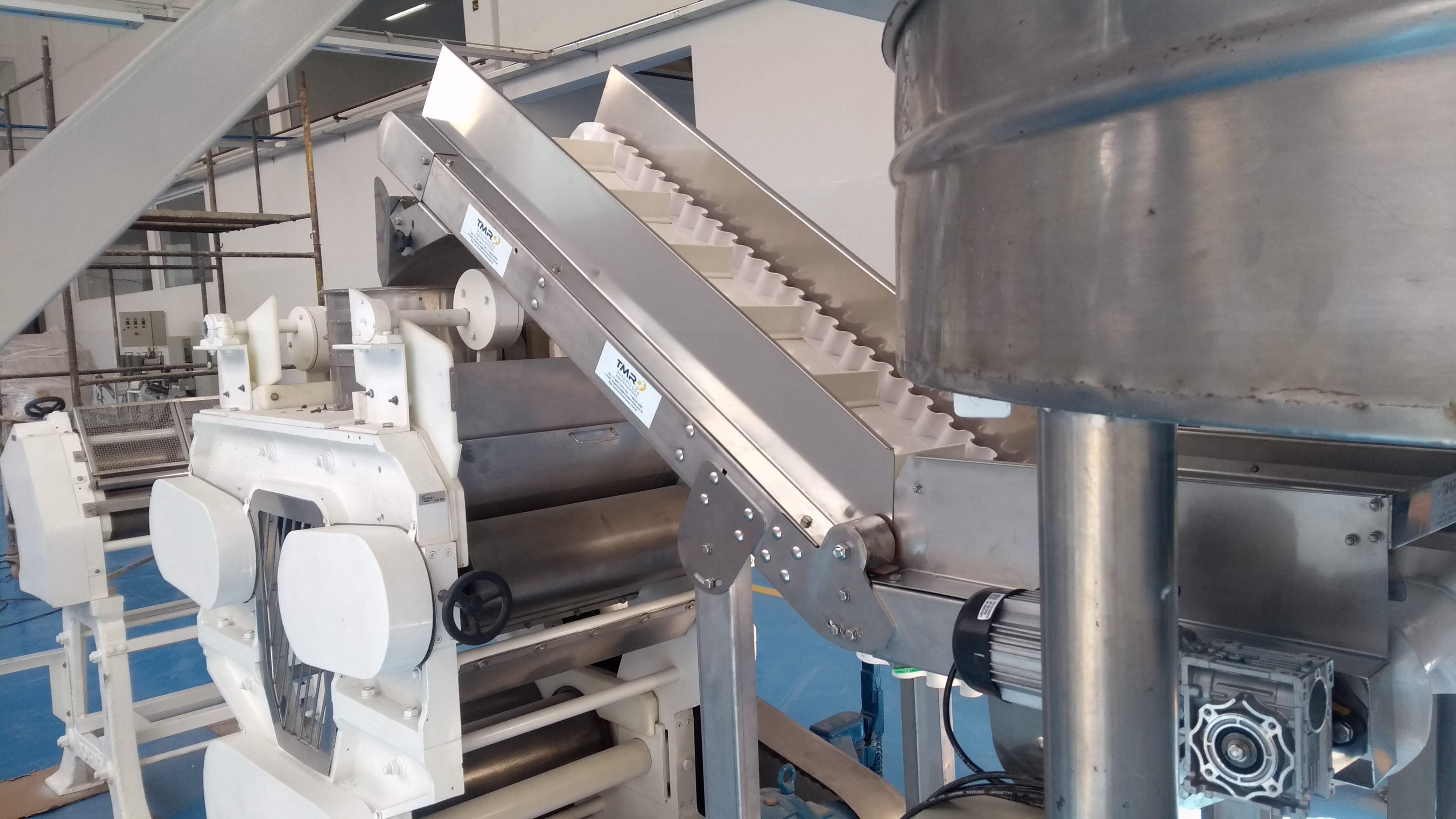 Esteira transportadora de aço inox??